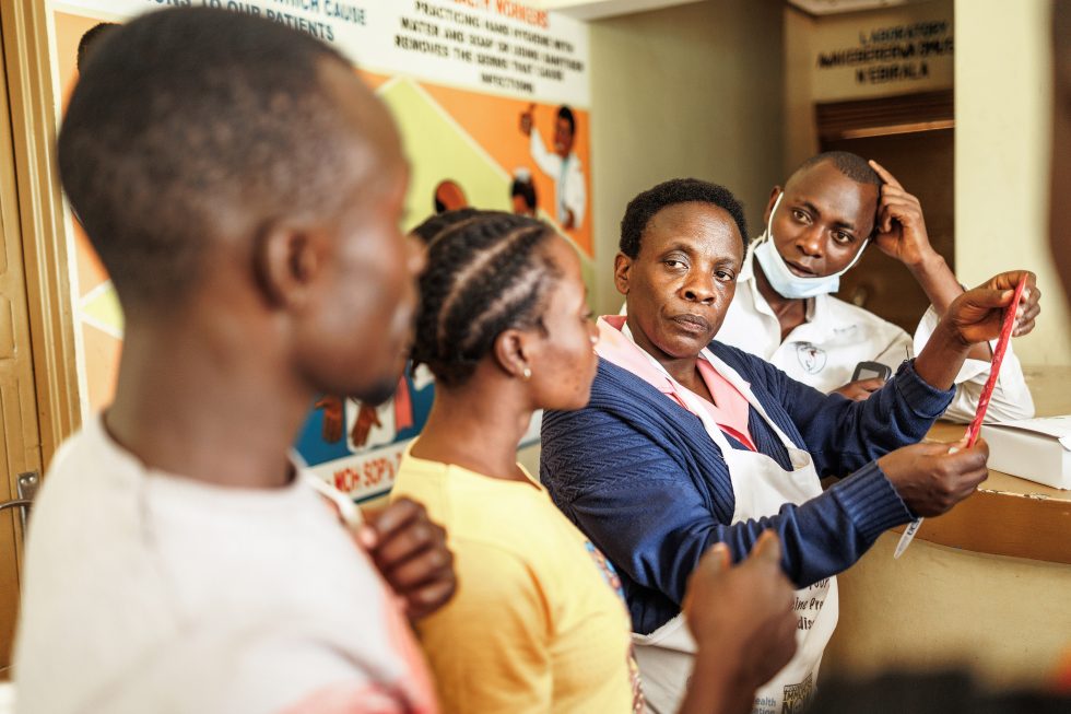 Youth in Mukono, Uganda talk to a health worker about contraceptives. Such learning is organised by Action 4 Health Uganda (A4HU) a youth empowerment organization dedicated to mainstreaming young peoples' engagement in socio-economic development and promoting Sexual and Reproductive Health